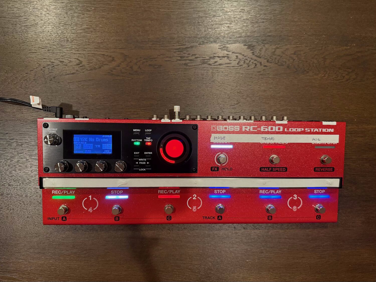 A BOSS RC-600 loop station pedal on a table
